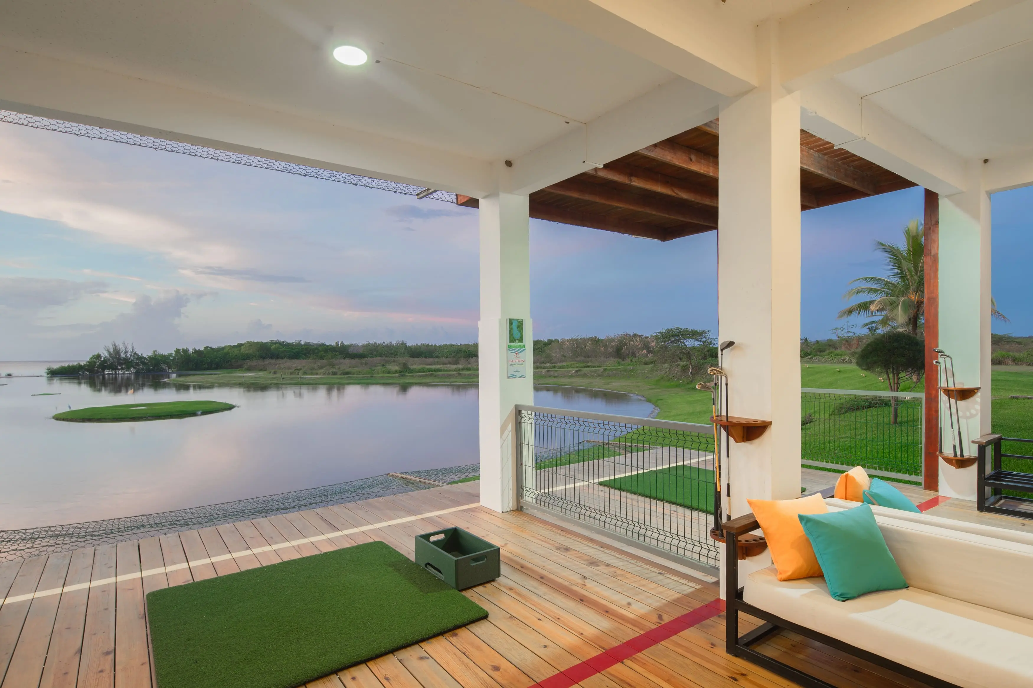 The driving range deck at Pristine Bay, overlooking the course and lagoon