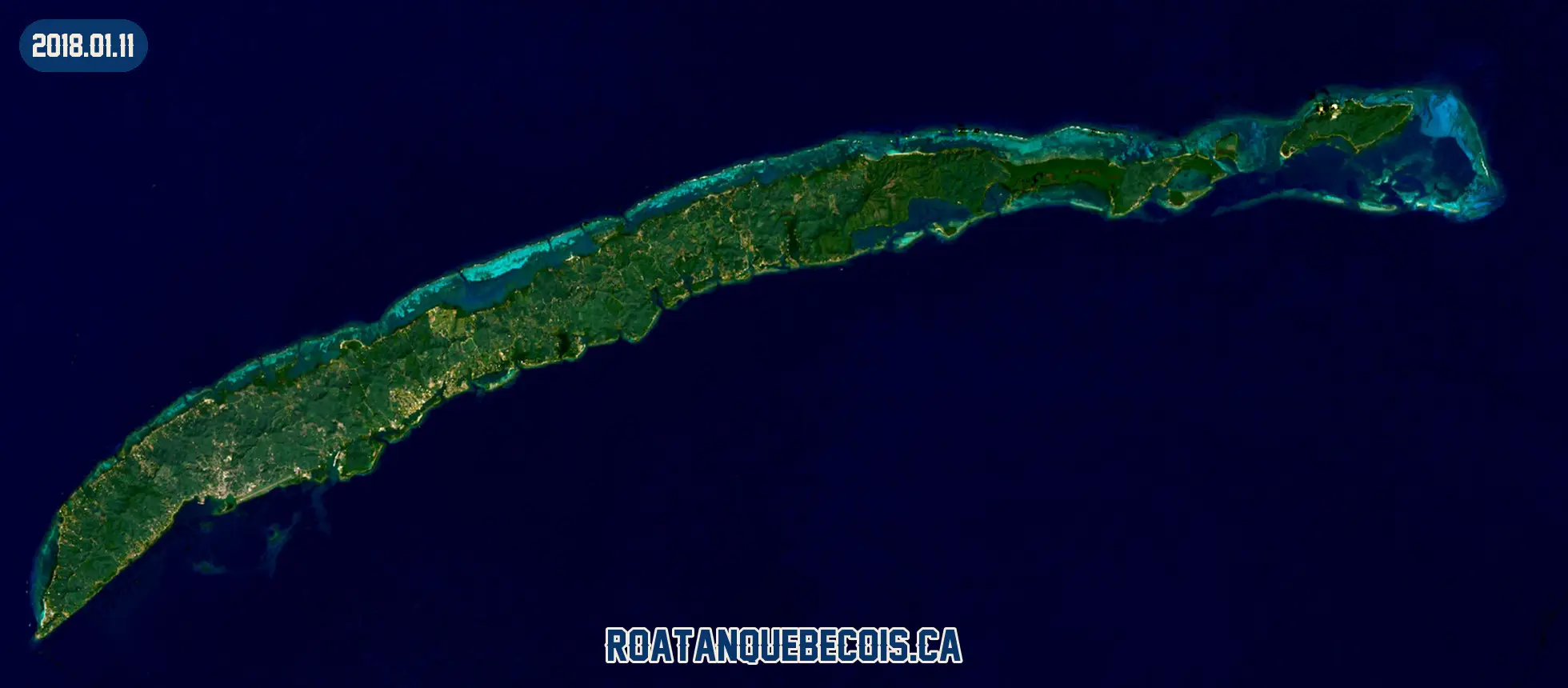 Roatán vue du ciel le 11 janvier 2018 : l'île entière, son récif et les zones bâties