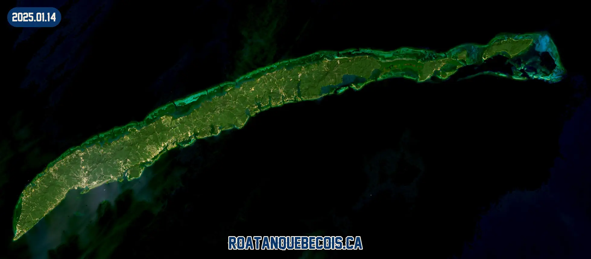 Roatán vue du ciel le 14 janvier 2025 : l'île entière, son récif et les zones bâties
