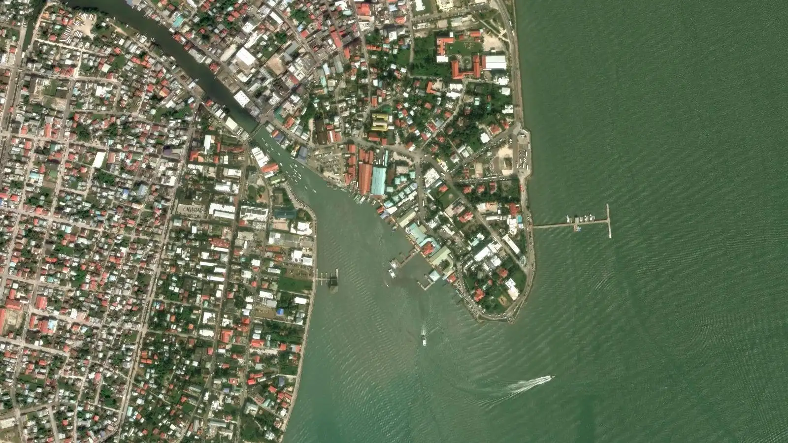 Belize City seen from above: the Fort Street Tourism Village tender pier, the Haulover Creek and the old town by the sea